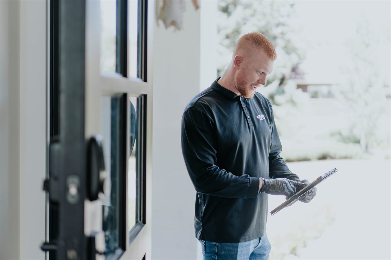 Pure Air Charlotte technician inspecting a Charlotte-area crawl space